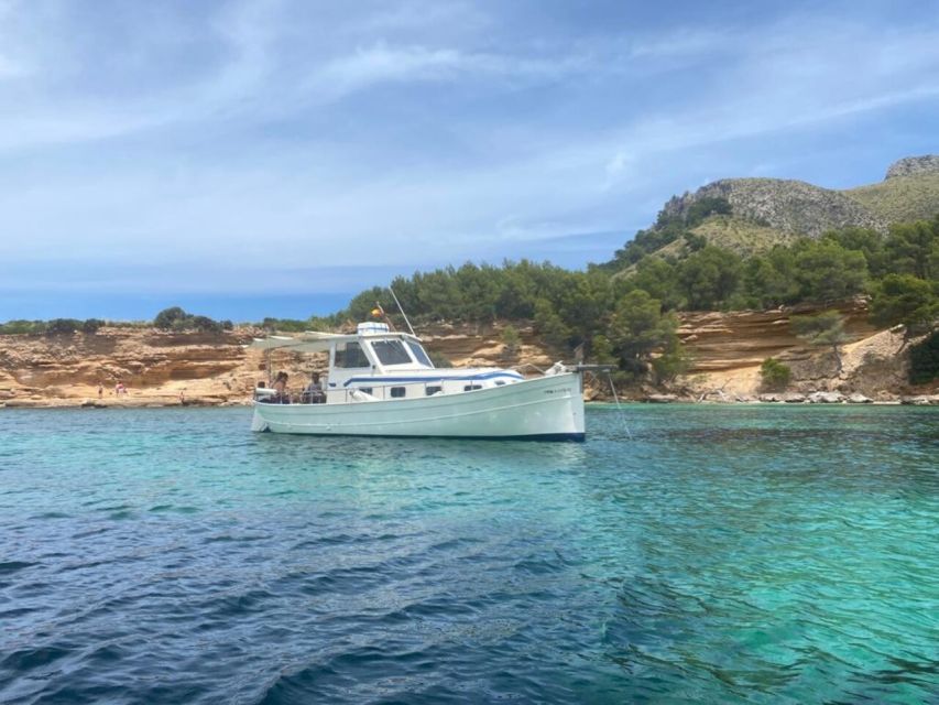 Alcudia: Traditional Wooden Boat Trip with Snorkeling - Along the northern coast toward Cap Menorca