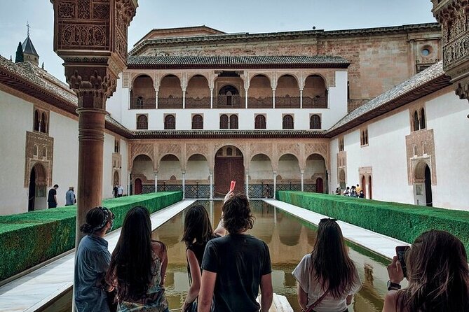 Alhambra Ticket Last Minute Deals - Climbing the Alcazaba ramparts