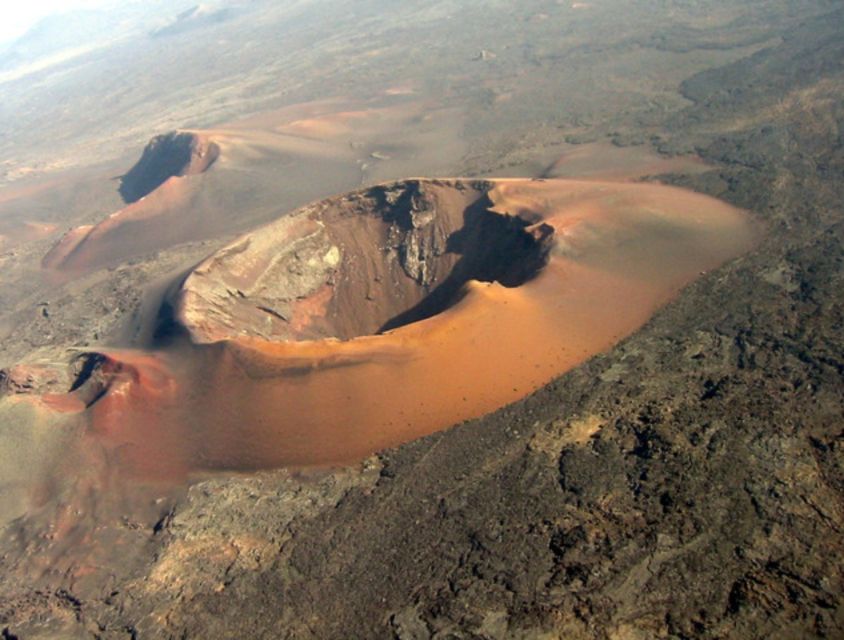 Arrecife/Playa Blanca: Timanfaya National Park Area Day Tour - The Volcanoes Route, viewed from a twisting coach road