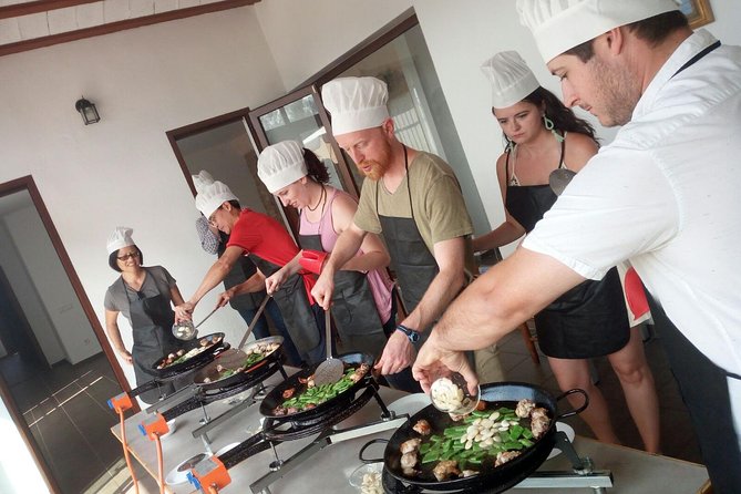 Authentic Valencian Paella Cooking Class - Eating the paella you helped prepare