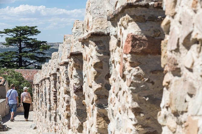 Avila with Walls and Segovia with Alcazar from Madrid - Avila appears behind its medieval walls