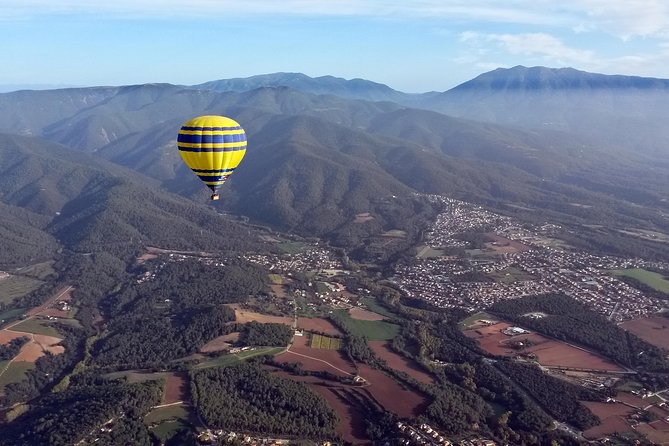 Balloon Ride over Catalonia with optional Pick-up from Barcelona - Taking off near medieval Vic