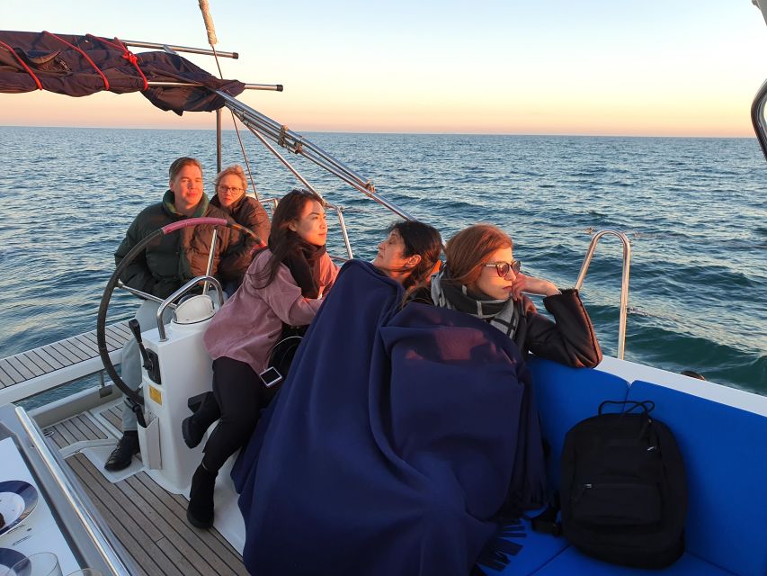 Barcelona: 2-Hour Sailboat Tour with Snacks and Drinks - What the skipper adds to the experience