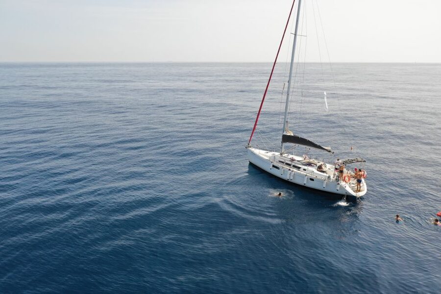 Barcelona: 2-Hour Sunset Sailboat Trip - Swimming, paddle boarding, and floating in Barcelona