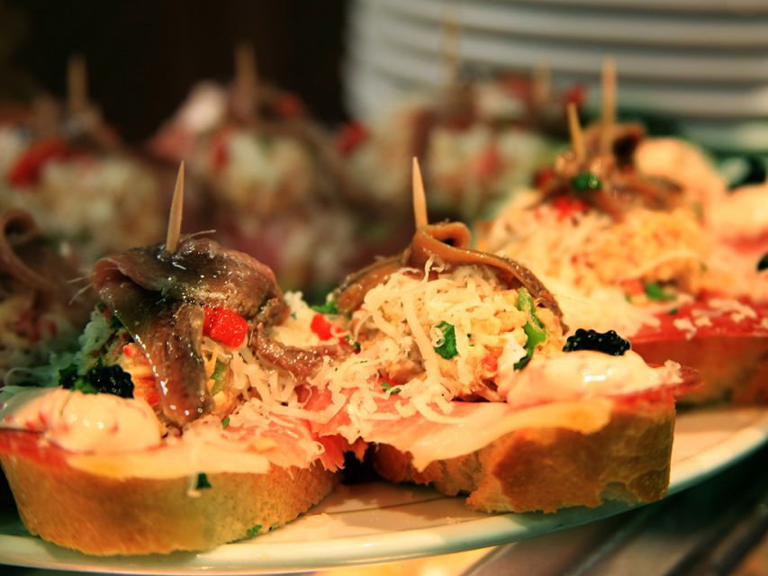 Barcelona: 4-Hour Tapas Evening Tour and Flamenco Show - Three or four tapas in a Gothic Quarter bar