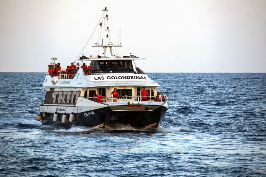 Barcelona: Boat Tour in Las Golondrinas - From the deck, the skyline becomes the main attraction