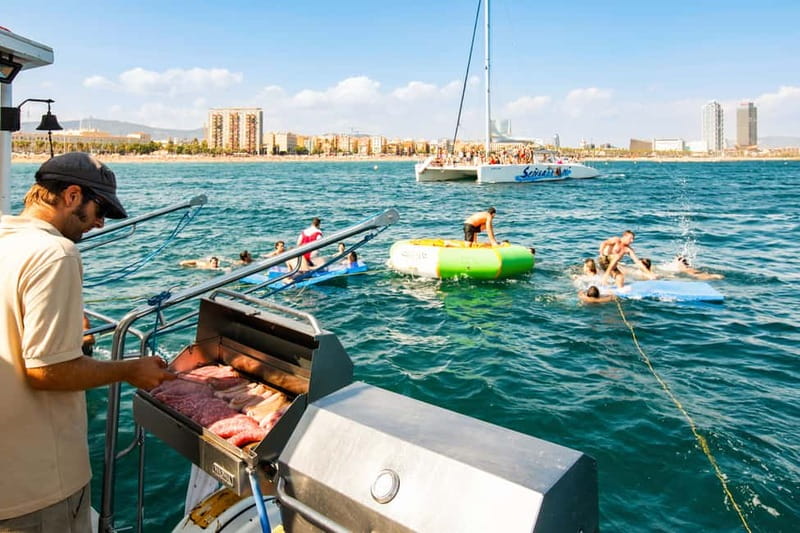 Barcelona: Catamaran Party Cruise with BBQ Meal - Leaving Port Olímpic for the Badalona coast
