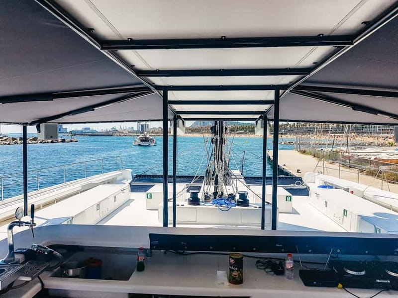 Barcelona: Catamaran Party Cruise with BBQ Meal - Music, dancing, and the crew