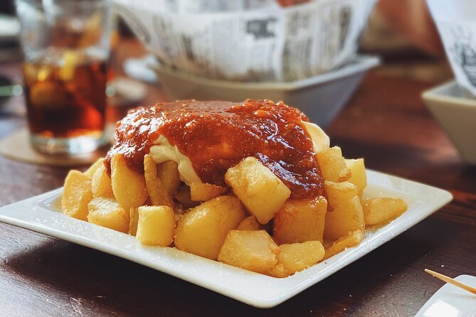Barcelona Food Tour: Tapas, Drinks and Delights with a Local - Plaça de Sant Josep Oriol and pintxos