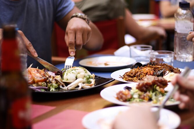 Barcelona Food Tour: Tapas, Paella, Sangria & 8+ Local Tastings - Starting beside Roman walls in the Gothic Quarter