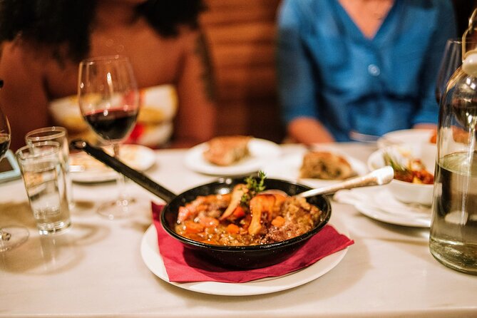 Barcelona Gothic Quarter Tapas & Taverns Food & Wine Tour - Walking through Roman and medieval Barcelona