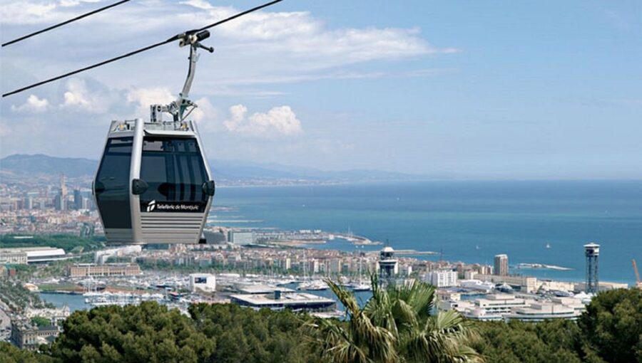 Barcelona: Montjuïc Cable Car Ticket with Audio Guide - Riding the Montjuïc Cable Car over Barcelona