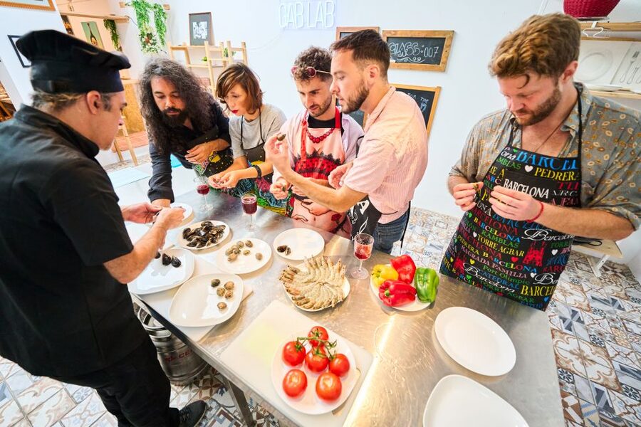 Barcelona: Paella Cooking Class with Market Visit and More - Dessert, tapas, and the shared table