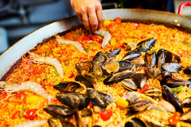 Barcelona Paella Cooking Class with Market Visit, Tapas & Sangria - Seeing Barcelona through La Boqueria Market