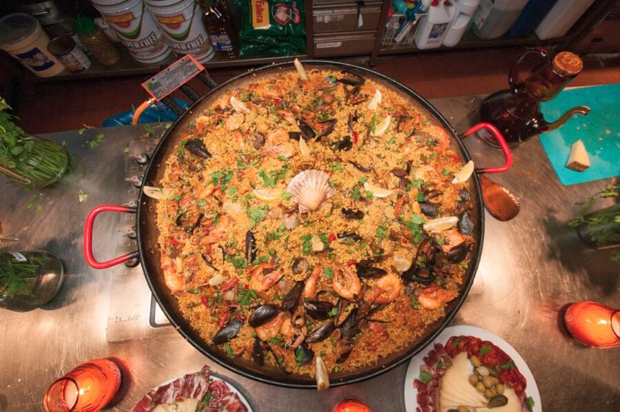 Barcelona: Paella Cooking Experience & Boqueria Market Tour - Learning Tapas Before the Paella