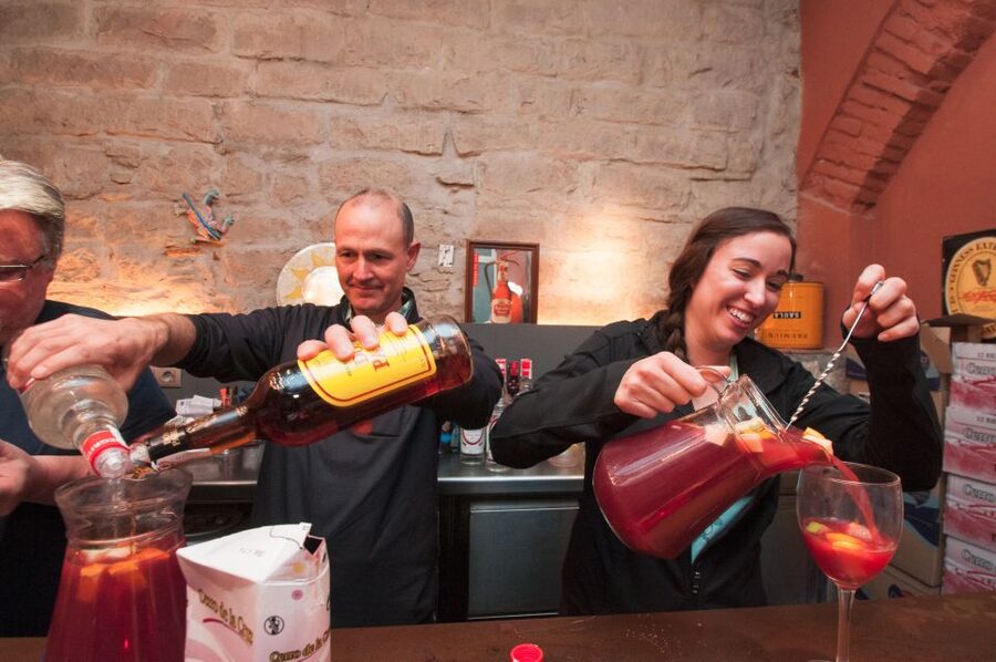 Barcelona: Paella Cooking Experience & Boqueria Market Tour - Mixing Sangria at the Bar