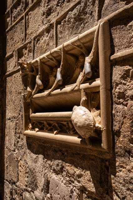 Barcelona: Sagrada Familia, Modernism, and Old Town Tour - Bishop’s Bridge, the Kiss Mural, and Plaça del Rei