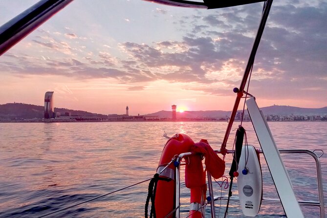 Barcelona Sensational Sunset Tour with Open Bar and Snacks - Sailing beneath Barcelona’s Olympic towers