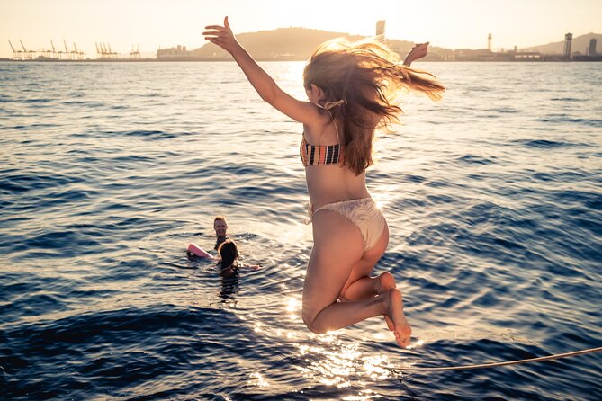 Barcelona Sunset Cruise with Light Snacks and Open Bar - Swimming when the sea permits