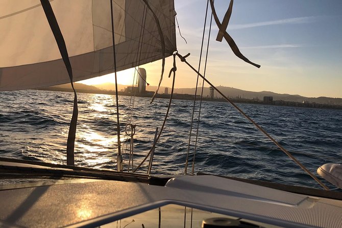 Barcelona Sunset Cruise with Light Snacks and Open Bar - A small boat changes the whole evening