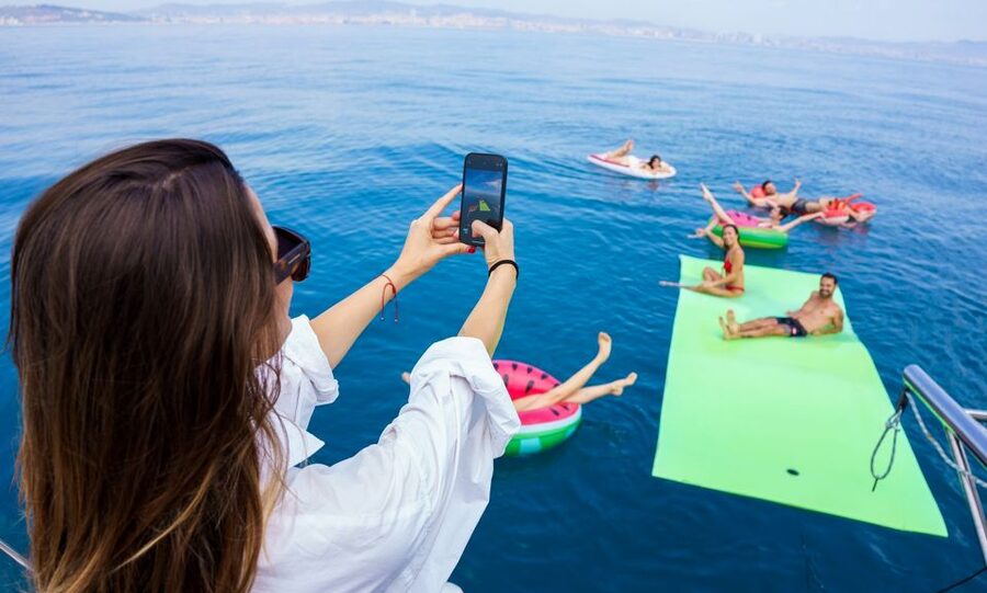 Barcelona: Sunset or Day Catamaran Cruise with Tapa & Drink - Finding your favorite place on the catamaran
