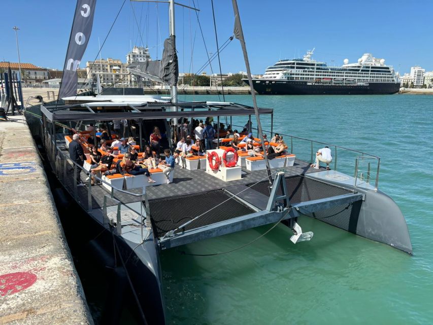 Cádiz: Sunset Catamaran Cruise Tours - Drinks, Music, and the Onboard Mood
