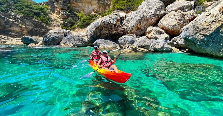 Cala Granadella: Cala en Caló Sea Cave Snorkel & Kayak Tour - Kayaking along Cala Granadella’s cliffs