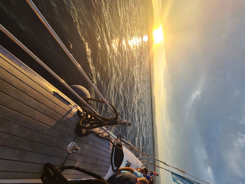 Cambrils: Costa Dorada Sunset Catamaran Cruise with Drinks - Watching the sunset from the water