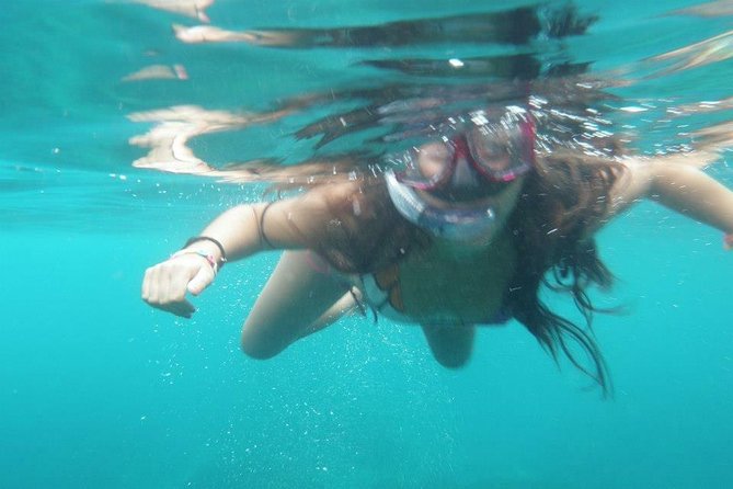 Catamaran ride -Costa Brava with barbecue and drinks. Familiar. - The cove stop, swimming, and clear water