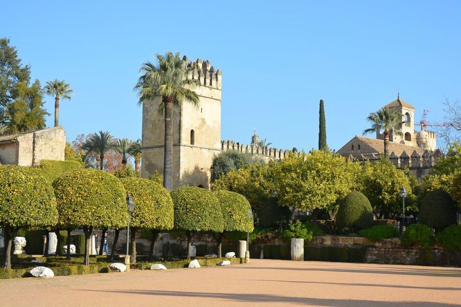 Cordóba: Gardens & Fortress of Catholic Monarchs Guided Tour - The royal residence and the story behind it