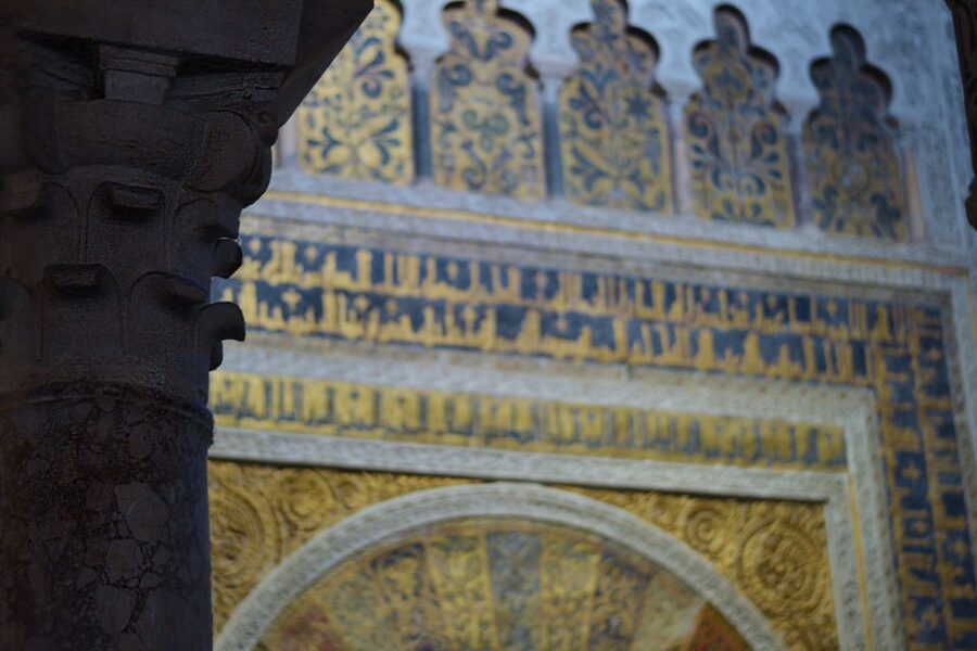 Córdoba: Mosque-Cathedral and Alcazar Tour - Inside the Mosque-Cathedral, where two faiths share one building