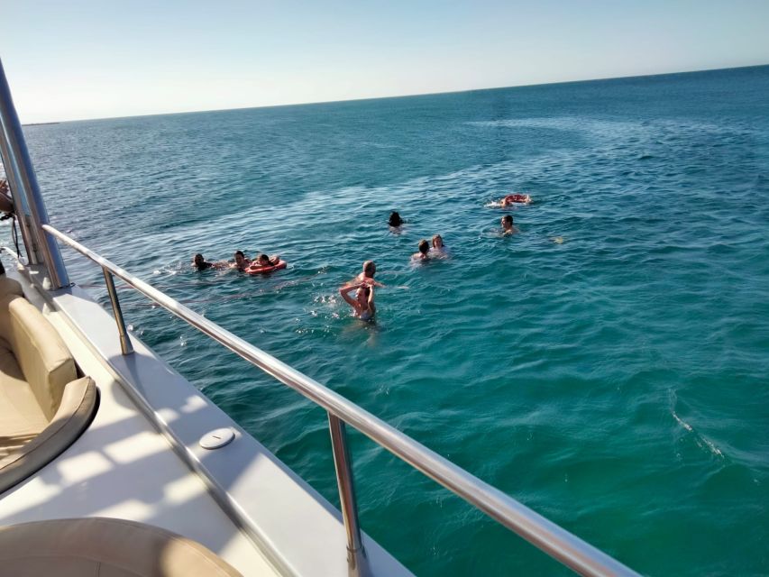 Denia: Cova Tallada Catamaran Tour and Swimming Stop - Music, a drink, and time on deck