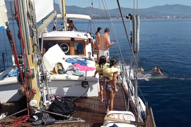 Dolphin Watching Adventure in Estepona Bay - Drinks, seating, and the onboard feel