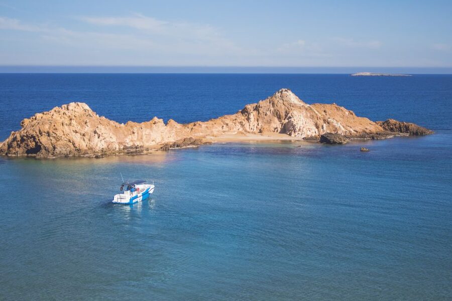 Fornells: 3-Hour Boat Tour Along Menorcan Coast - East toward caves, coves, and red beaches