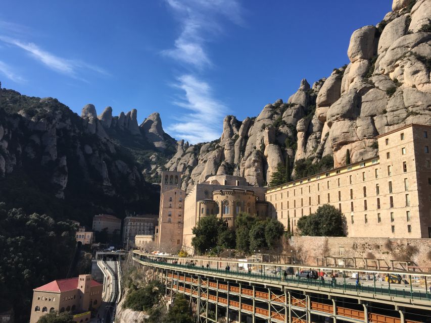 From Barcelona: Montserrat Monastery & Scenic Mountain Hike - Inside the Benedictine monastery