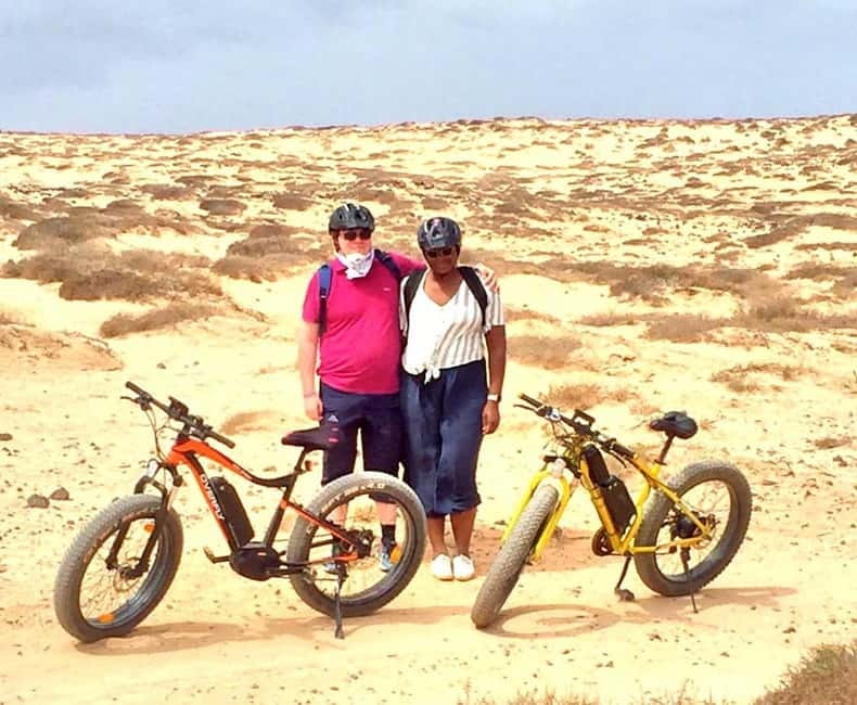 From Corralejo: Fuerteventura Guided E-Bike/E-scooter Tour - A café pause near Lajares