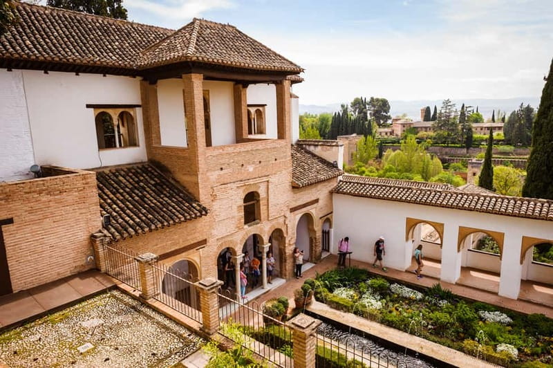 From Costa del Sol: Granada Full-Day Tour - Walking, stairs, and the pace of the monument