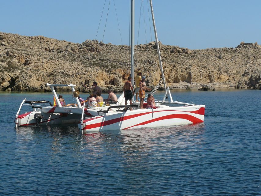 From Fornells: Half-Day Menorca Catamaran Trip w/ Snorkeling - Sailing through the northern marine reserve