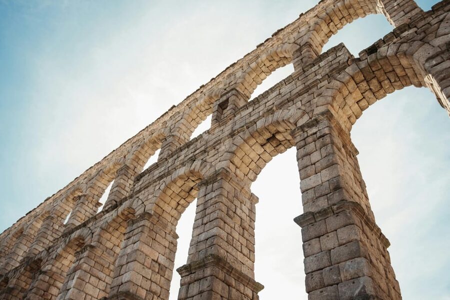 From Madrid: Half-Day or Full-Day Trip to Segovia - Walking from the aqueduct to Plaza Mayor