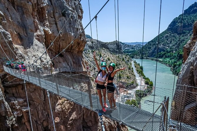 From Malaga Caminito del Rey Guided Tour with transportation - Walking the rebuilt path through the gorge