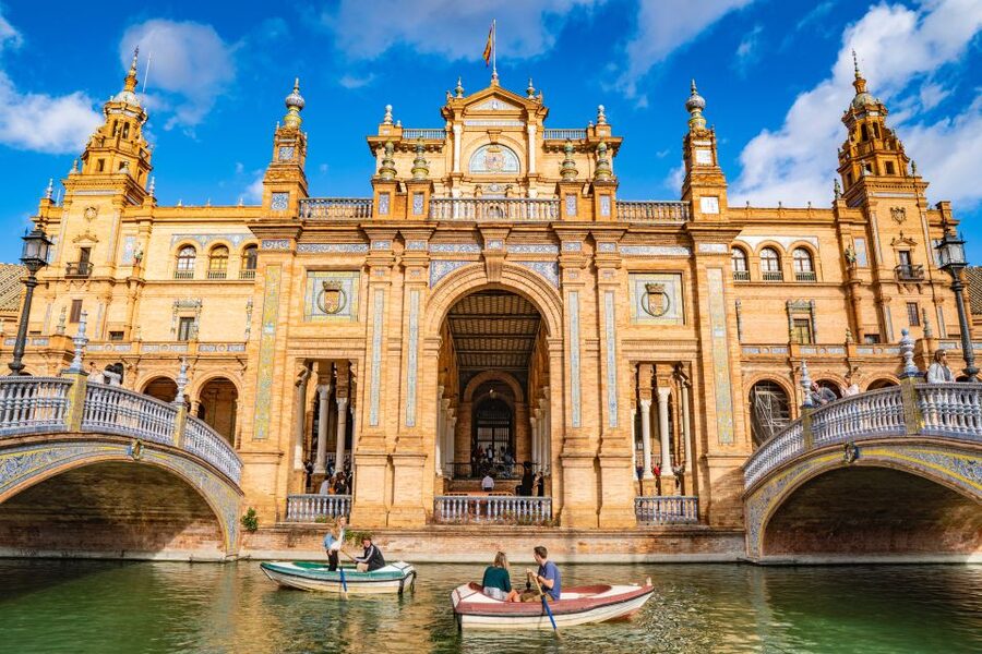 From Malaga: Seville Day Trip and Optional Monument Tickets - Puerta de Jerez is your timekeeper