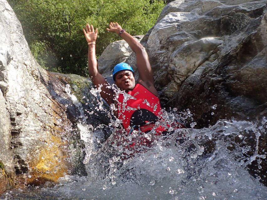 From Marbella: Guadalmina River Guided Canyoning Adventure - A guide-led experience with a relaxed feel