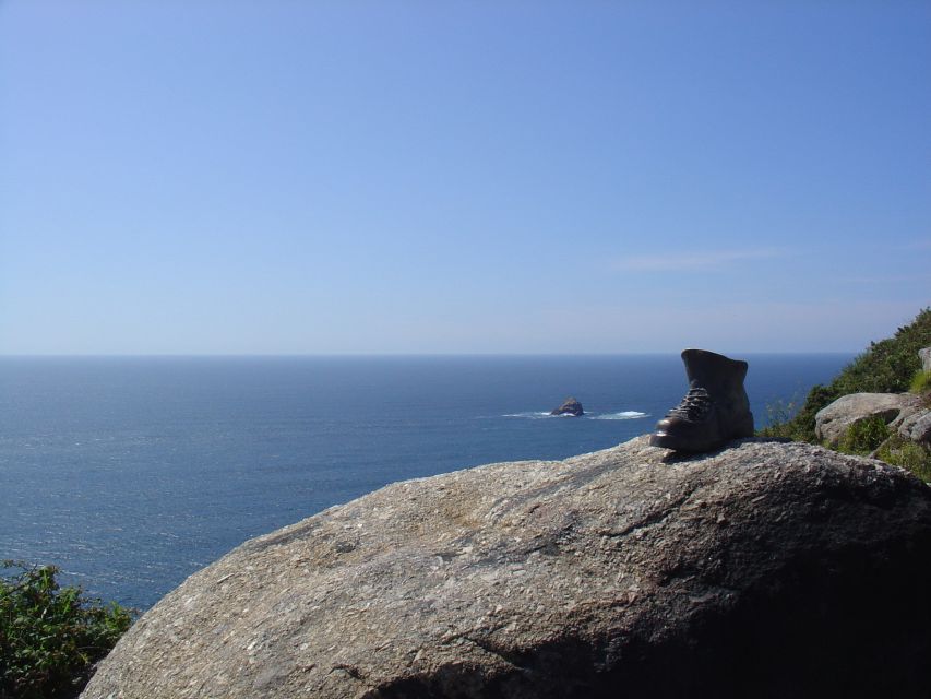 From Santiago: Finisterre, Muxia & Costa da Morte Excursion - Ezaro Waterfall reaches the Atlantic