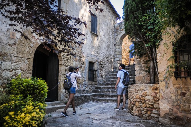 Girona & Costa Brava Small Group Tour From Barcelona with Paella! - Calella de Palafrugell at 11:45 a.m., the seaside heart of the tour
