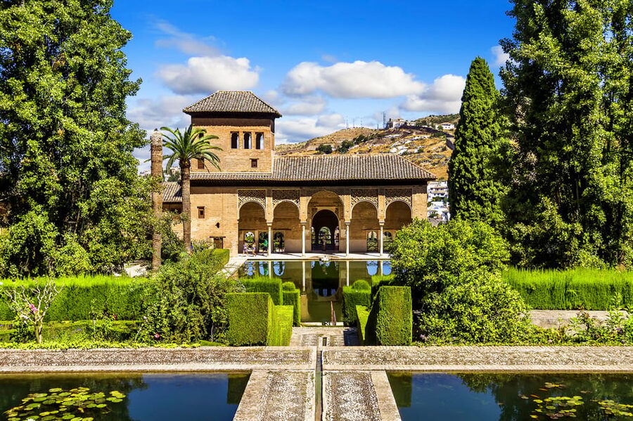 Granada: Alhambra and Albaicín Small Group Tour - The Palace of Charles V adds a sharp historical contrast