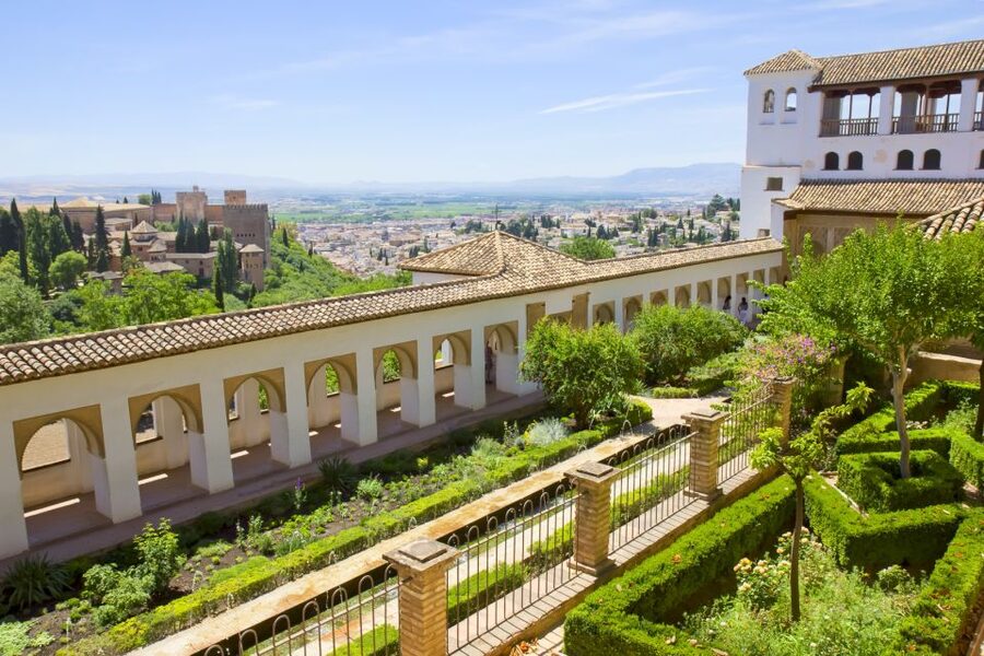 Granada: Alhambra Small Group Tour with Nasrid Palaces - Carlos V Palace, a sharp change of style