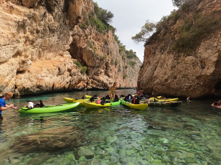 Granadella: Caló, Cova Llop Marí, and Ambolo Kayak Trip - Parking and meeting at Granadella Cove