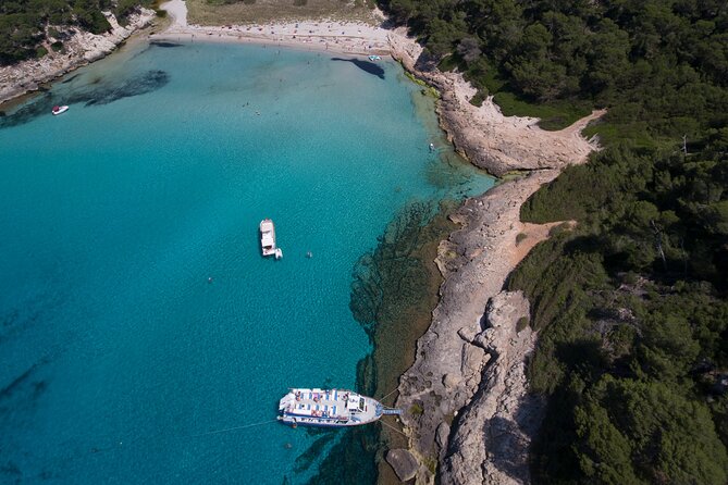 Half-Day Boat Tour along The South Coast of Menorca - Swimming, snorkelling, and the glass-bottom viewing area