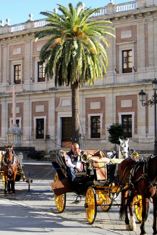 Horse-Drawn Carriage Ride Through Seville - Torre del Oro and Seville’s river edge
