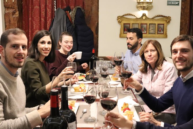 Iberian Ham and Wine Small Group Tour in Madrid - First stop: classic tapas and two Spanish wines